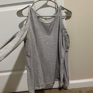 Large, cold shoulder long sleeved shirt.